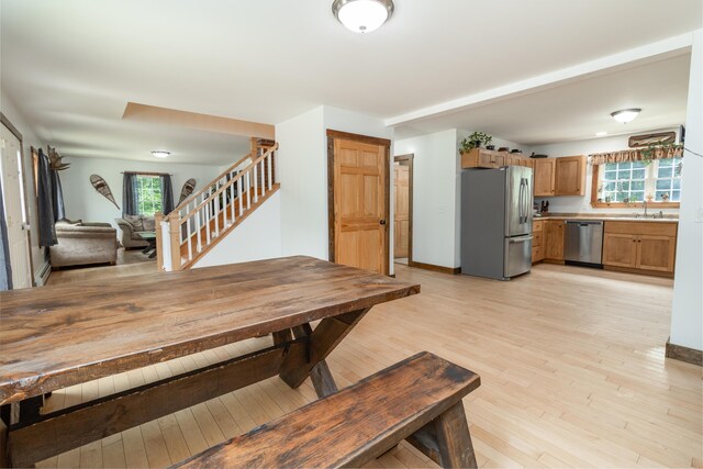 310 Fields Hill Rd, Sumner, ME 04292 - dining area featuring stairs, healthy amount of natural light, and light wood-style floors