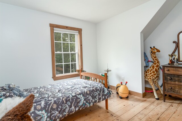 310 Fields Hill Rd, Sumner, ME 04292 - bedroom featuring hardwood / wood-style flooring and baseboards