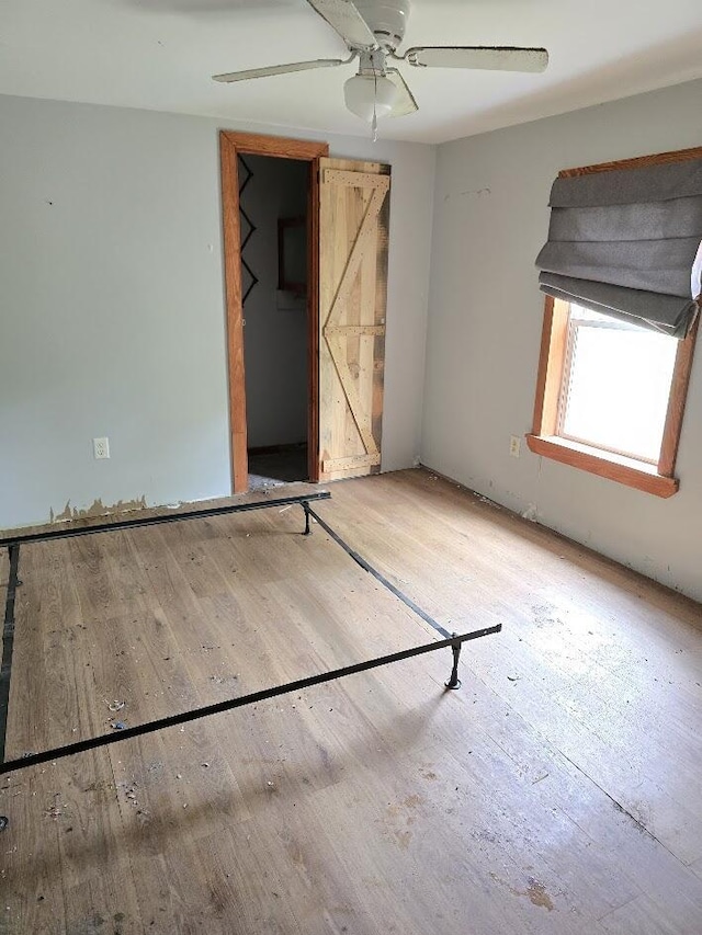 230 Todds Corner Rd, Saint Albans, ME 04971 - unfurnished bedroom featuring wood finished floors