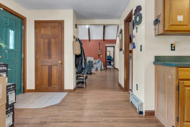 32 Milky Way Ln, Durham, ME 04222 - foyer entrance with light wood-type flooring and a baseboard radiator