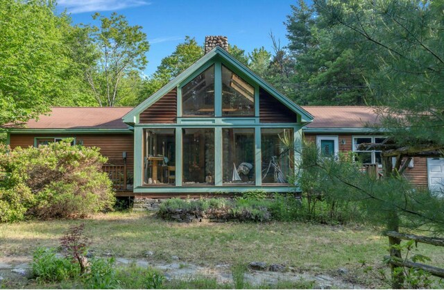 32 Milky Way Ln, Durham, ME 04222 - view of home's exterior featuring a sunroom and a chimney
