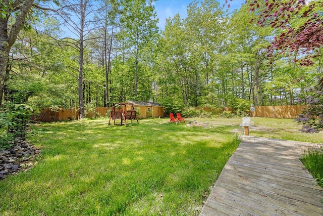 2 Blueberry Pines Dr, Kennebunk, ME 04043 - view of yard with a playground and a wooden deck