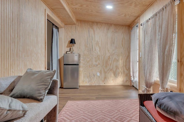 41 Sunny Ln, Sanford, ME 04073 - living area featuring wood finished floors and wood walls
