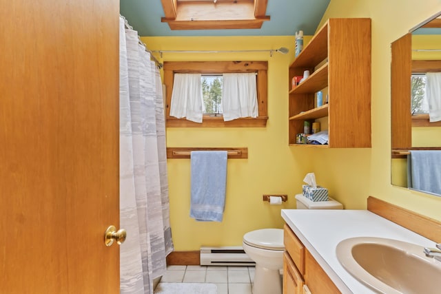 82 Littlefield Rd, Wells, ME 04090 - full bath featuring a baseboard radiator, toilet, tile patterned floors, and vanity