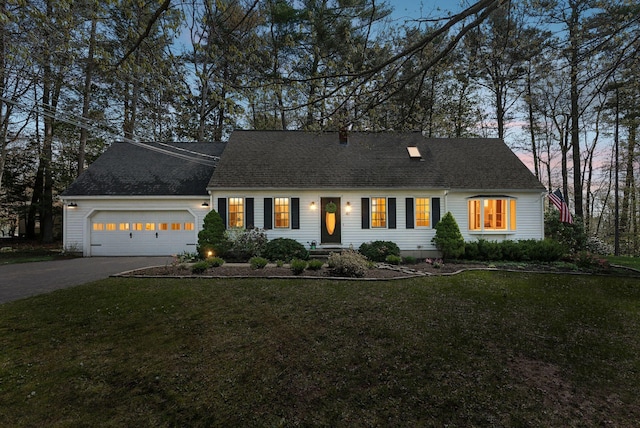 47 Old Post Ln, Sanford, ME 04073 - new england style home featuring driveway, an attached garage, a lawn, and roof with shingles