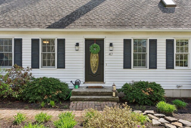47 Old Post Ln, Sanford, ME 04073 - view of exterior entry featuring a shingled roof