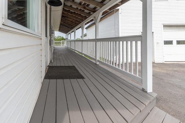 982 Main St, Grand Isle, ME 04746 - wooden terrace with a garage
