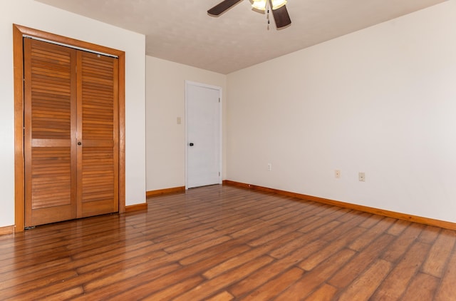 982 Main St, Grand Isle, ME 04746 - unfurnished bedroom featuring baseboards, wood finished floors, ceiling fan, and a closet
