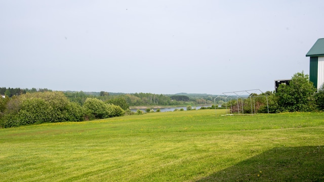 982 Main St, Grand Isle, ME 04746 - view of green lawn featuring a water view