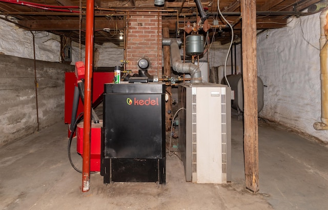 982 Main St, Grand Isle, ME 04746 - utility room featuring oil tank