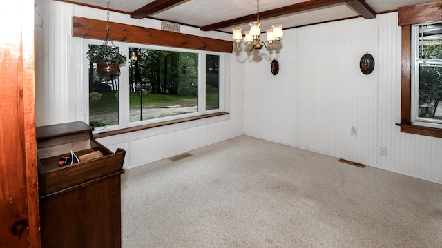 20 Rabbit Ln, Naples, ME 04055 - unfurnished dining area featuring carpet, a chandelier, and beamed ceiling