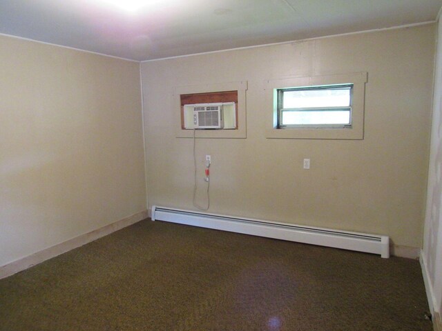 25 Moores Mill Rd, Canaan, ME 04924 - carpeted empty room with a baseboard heating unit, baseboards, and a wall mounted AC