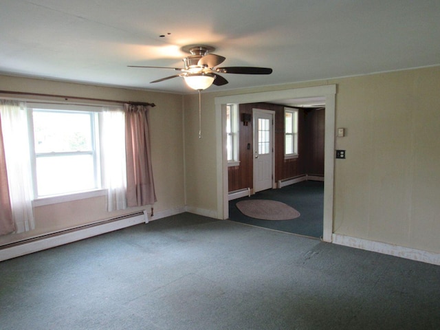 25 Moores Mill Rd, Canaan, ME 04924 - spare room with baseboard heating, ceiling fan, and carpet floors