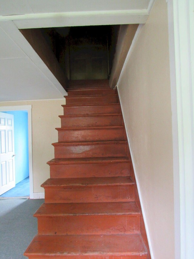 25 Moores Mill Rd, Canaan, ME 04924 - staircase featuring baseboards