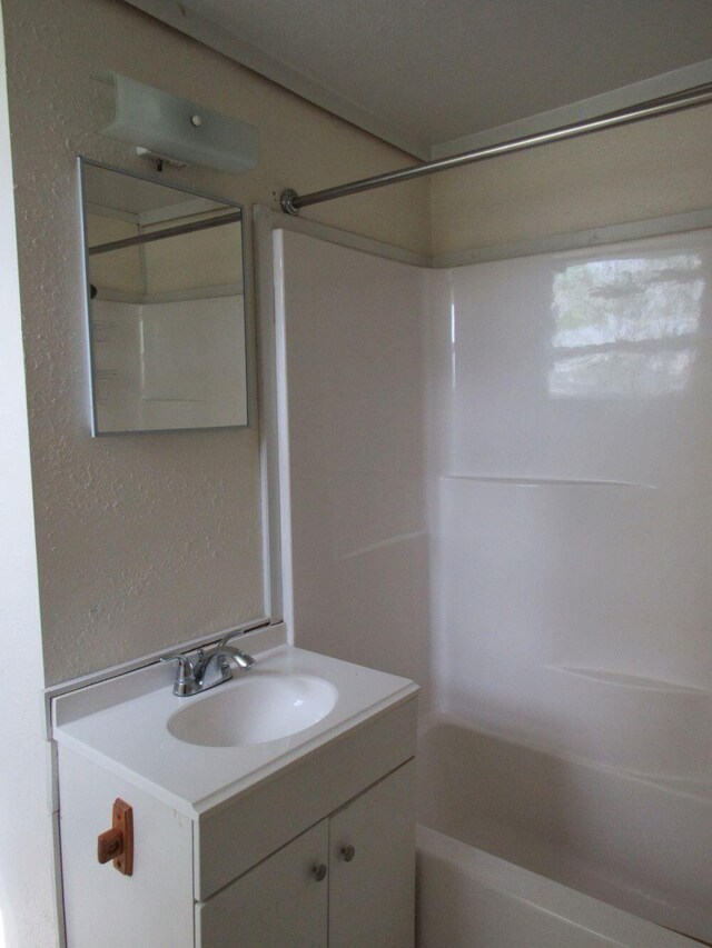 25 Moores Mill Rd, Canaan, ME 04924 - bathroom with vanity and washtub / shower combination