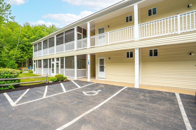 1762 Post Rd Unit 115, Wells, ME 04090 - view of property featuring uncovered parking