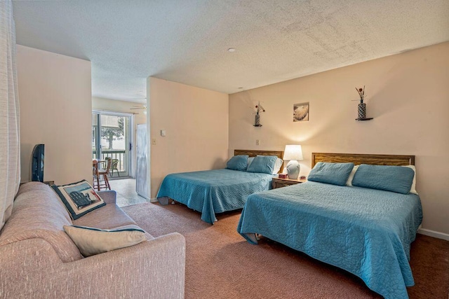 1762 Post Rd Unit 115, Wells, ME 04090 - bedroom with carpet floors and a textured ceiling