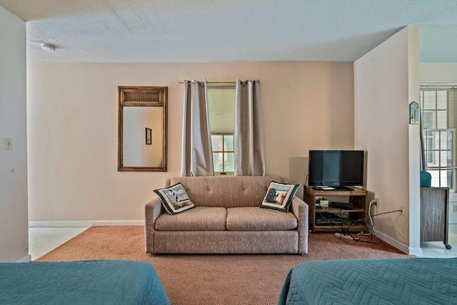 1762 Post Rd Unit 115, Wells, ME 04090 - carpeted bedroom featuring baseboards