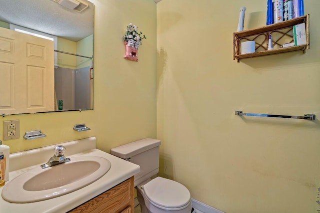 1762 Post Rd Unit 115, Wells, ME 04090 - full bathroom featuring toilet and vanity