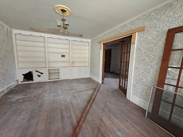 9 St Albans Rd, Corinna, ME 04928 - unfurnished room featuring wallpapered walls, wood finished floors, and crown molding