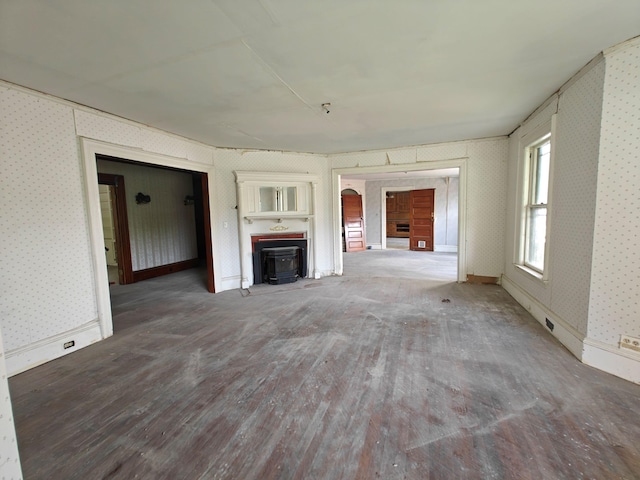 9 St Albans Rd, Corinna, ME 04928 - unfurnished living room with wood finished floors and wallpapered walls