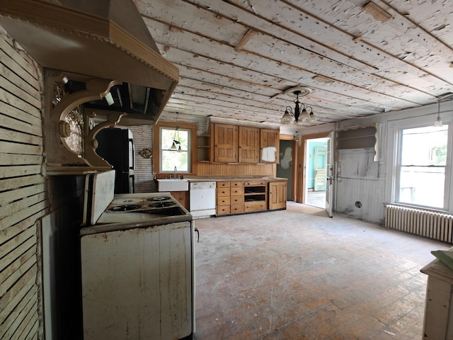 9 St Albans Rd, Corinna, ME 04928 - kitchen with radiator heating unit, dishwasher, open shelves, a chandelier, and brown cabinets