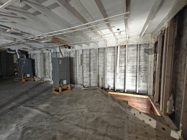 9 St Albans Rd, Corinna, ME 04928 - unfinished below grade area featuring heating unit