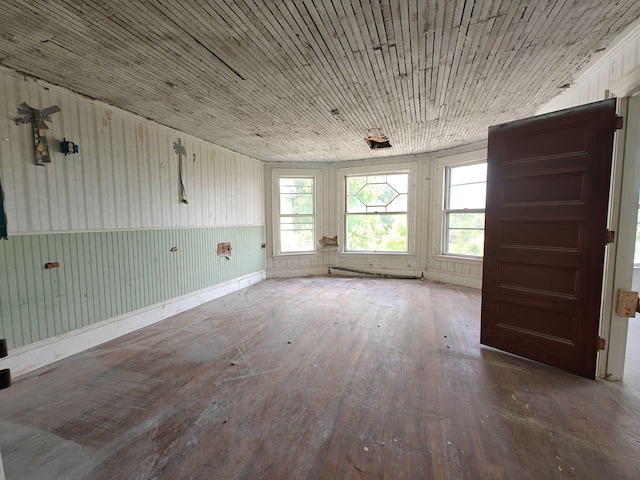 9 St Albans Rd, Corinna, ME 04928 - empty room with wood-type flooring and healthy amount of natural light