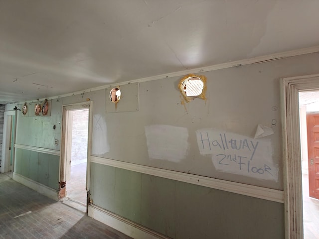 9 St Albans Rd, Corinna, ME 04928 - hall featuring wood finished floors, wooden walls, and wainscoting
