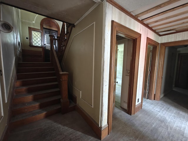 9 St Albans Rd, Corinna, ME 04928 - staircase featuring wood finished floors and crown molding
