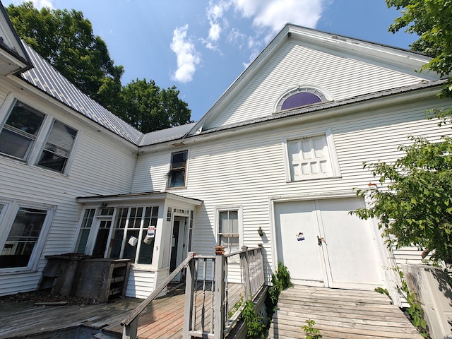 9 St Albans Rd, Corinna, ME 04928 - back of house with a metal roof and a deck