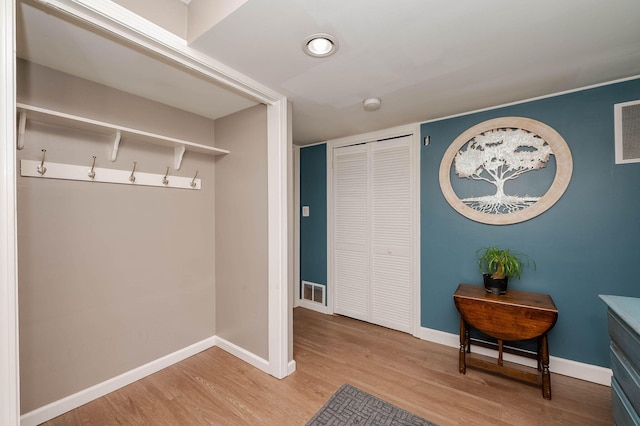 59 Milton Mills Rd, Lebanon, ME 04027 - mudroom with light wood-style floors and baseboards