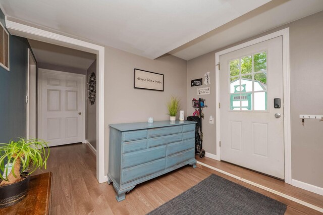 59 Milton Mills Rd, Lebanon, ME 04027 - entrance foyer featuring wood finished floors and baseboards