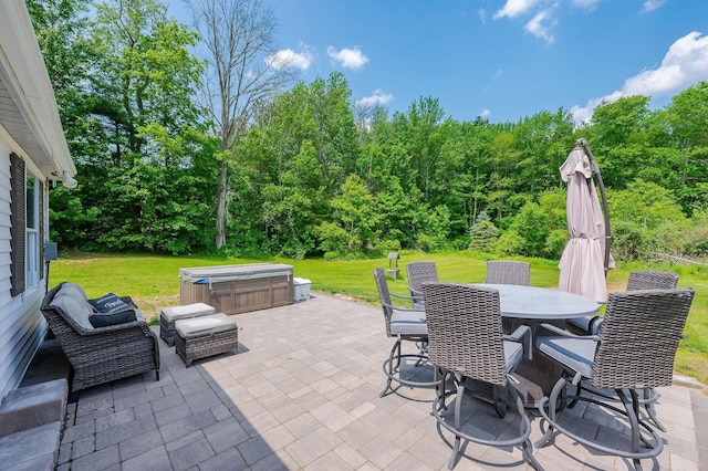 59 Milton Mills Rd, Lebanon, ME 04027 - view of patio / terrace with a hot tub and outdoor dining space