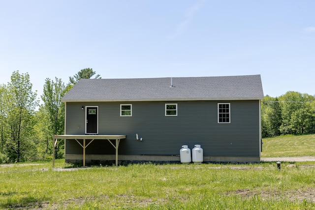 44 Bailey Rd, Cambridge, ME 04923 - rear view of house featuring roof with shingles
