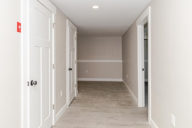 44 Bailey Rd, Cambridge, ME 04923 - corridor with light wood-type flooring, baseboards, and recessed lighting