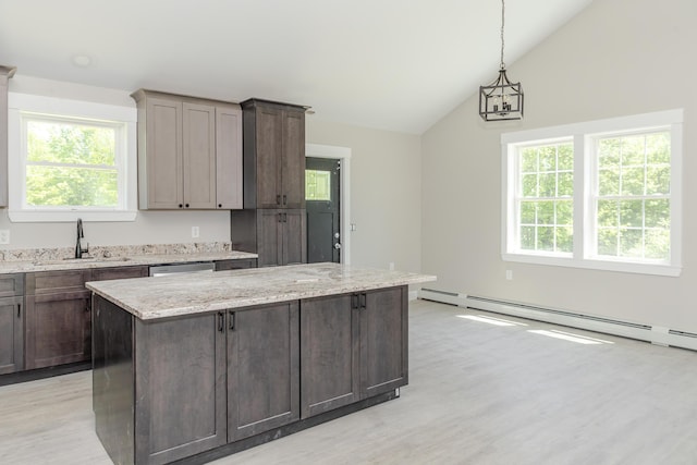 44 Bailey Rd, Cambridge, ME 04923 - kitchen with a sink, plenty of natural light, light wood-style floors, and lofted ceiling