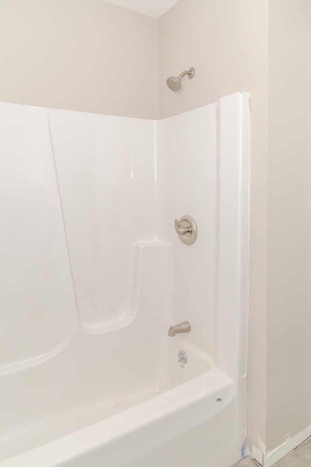 44 Bailey Rd, Cambridge, ME 04923 - bathroom with bathing tub / shower combination and baseboards