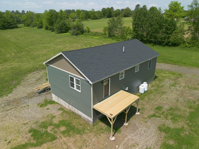 44 Bailey Rd, Cambridge, ME 04923 - view of subject property with a tree filled landscape