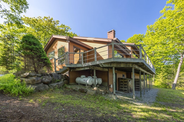5 Spring Mountain Dr, Rockport, ME 04856 - back of house featuring a chimney and a wooden deck