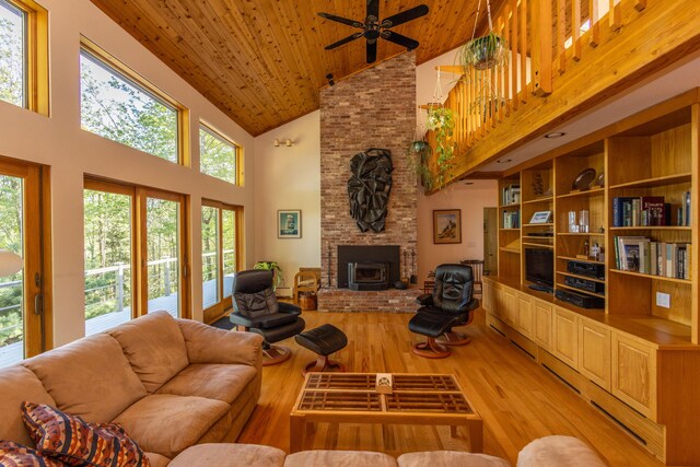 5 Spring Mountain Dr, Rockport, ME 04856 - living area with high vaulted ceiling, wood finished floors, ceiling fan, plenty of natural light, and wooden ceiling