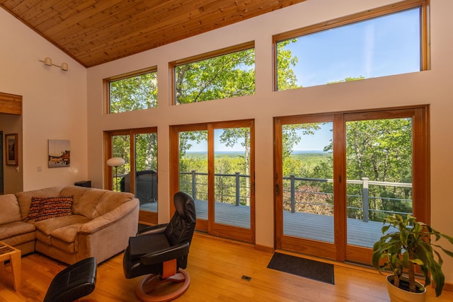 5 Spring Mountain Dr, Rockport, ME 04856 - living room with high vaulted ceiling, light wood-style floors, and wood ceiling