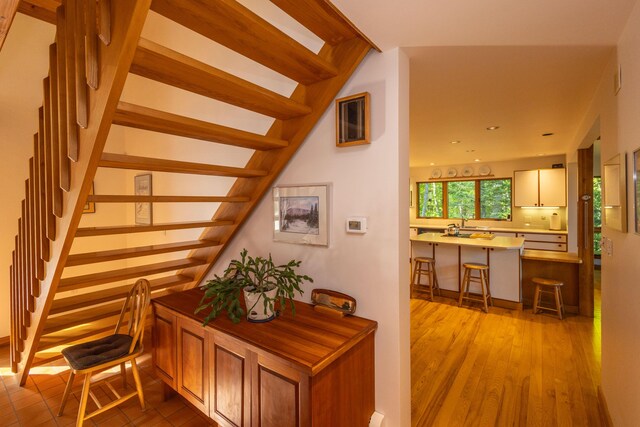 5 Spring Mountain Dr, Rockport, ME 04856 - hall with stairs, wood finished floors, a sink, and recessed lighting