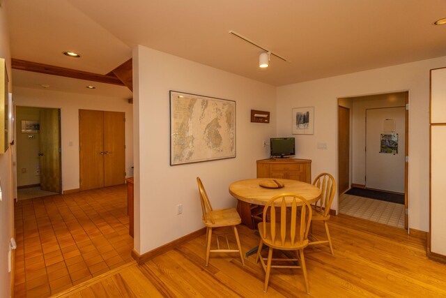 5 Spring Mountain Dr, Rockport, ME 04856 - dining space featuring light wood finished floors, track lighting, baseboards, and recessed lighting