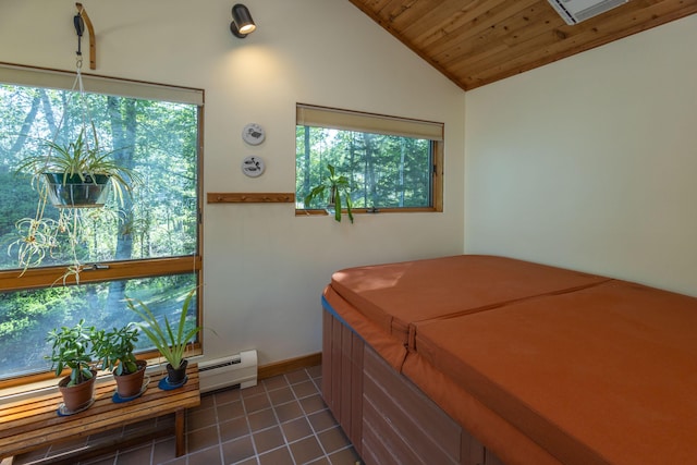 5 Spring Mountain Dr, Rockport, ME 04856 - bedroom featuring wood ceiling, a baseboard radiator, lofted ceiling, dark tile patterned flooring, and baseboards
