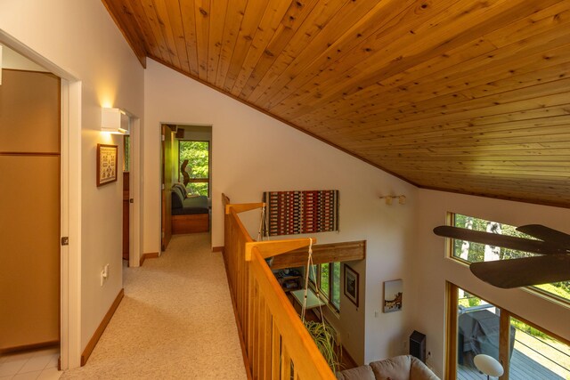 5 Spring Mountain Dr, Rockport, ME 04856 - hall featuring vaulted ceiling, an upstairs landing, wood ceiling, light colored carpet, and baseboards
