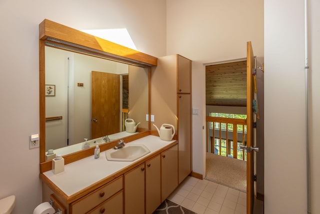 5 Spring Mountain Dr, Rockport, ME 04856 - bathroom with toilet, tile patterned floors, vanity, and baseboards