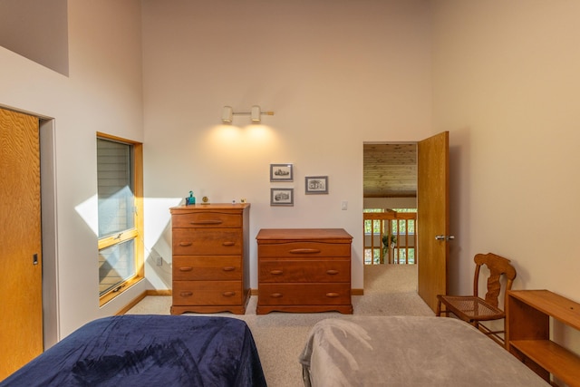 5 Spring Mountain Dr, Rockport, ME 04856 - carpeted bedroom with a towering ceiling and baseboards