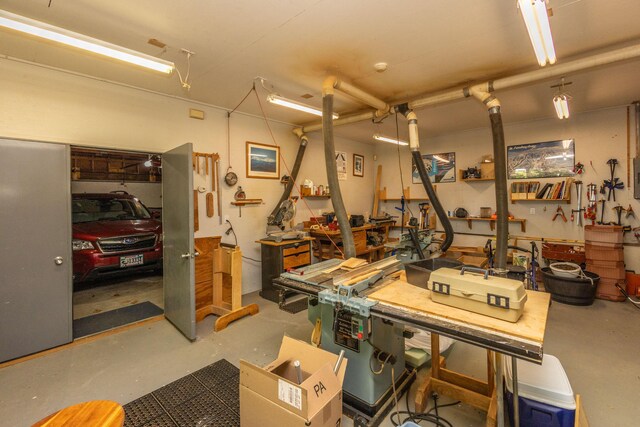 5 Spring Mountain Dr, Rockport, ME 04856 - garage featuring a workshop area