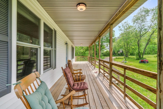 612 Airline Rd, Amherst, ME 04605 - wooden porch with a lawn